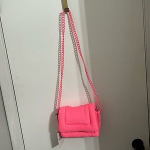 Pink designer purse NWT and dust bag.